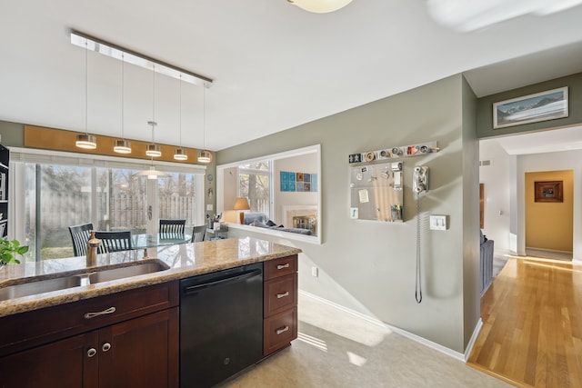 1826 Poppleton Dr, West Bloomfield, MI 48324 - kitchen featuring dark brown cabinetry, light stone counters, dishwasher, decorative light fixtures, and baseboards