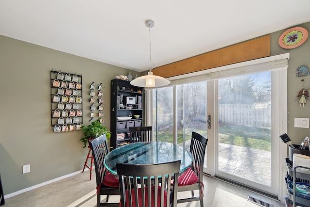 1826 Poppleton Dr, West Bloomfield, MI 48324 - dining room featuring visible vents and baseboards