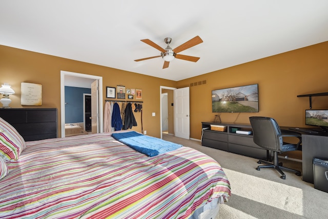 1826 Poppleton Dr, West Bloomfield, MI 48324 - carpeted bedroom with visible vents, a ceiling fan, and ensuite bath