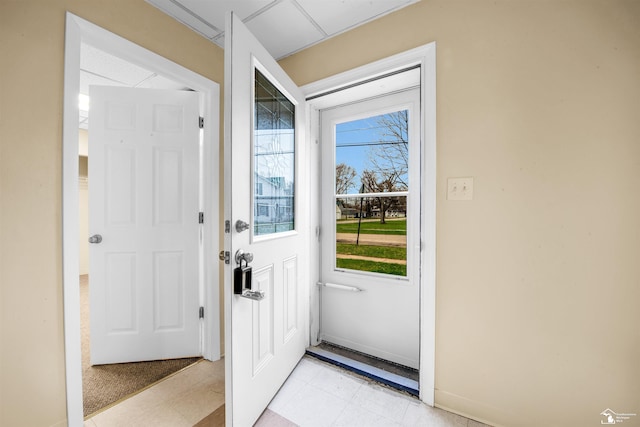 12800 Matthews St, Carleton, MI 48117 - doorway featuring light floors and baseboards