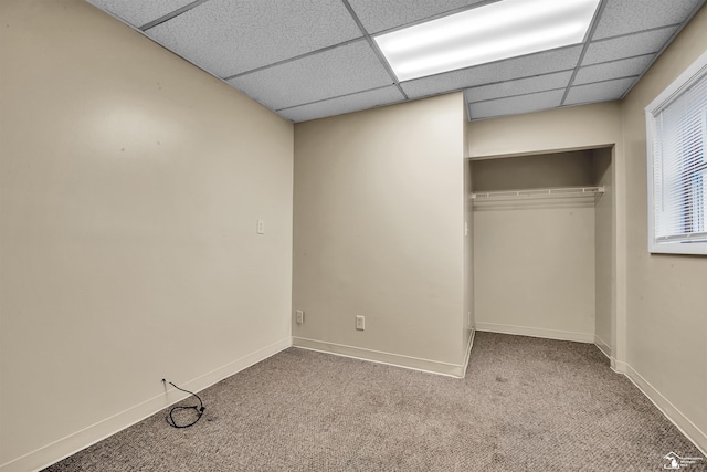 12800 Matthews St, Carleton, MI 48117 - unfurnished bedroom with a drop ceiling, carpet, baseboards, and a closet