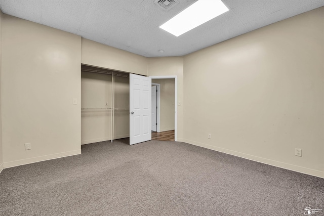 12800 Matthews St, Carleton, MI 48117 - unfurnished bedroom featuring carpet, baseboards, and a closet