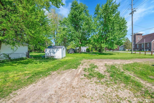 12800 Matthews St, Carleton, MI 48117 - view of yard with a storage shed and an outdoor structure