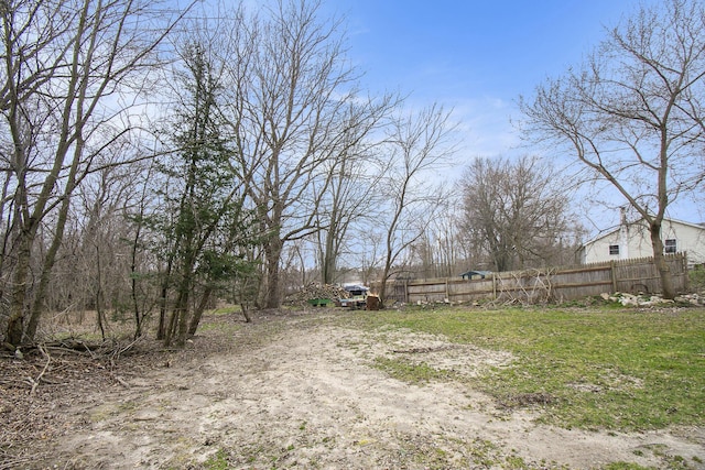 view of yard with fence