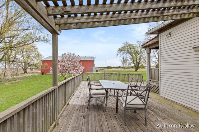 wooden deck with a pergola, a yard, and outdoor dining space