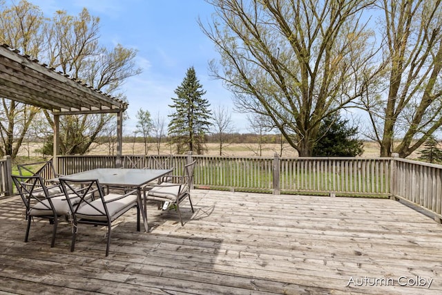 wooden deck featuring outdoor dining space