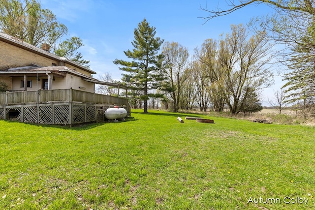 view of yard featuring a deck