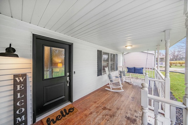 doorway to property with a porch