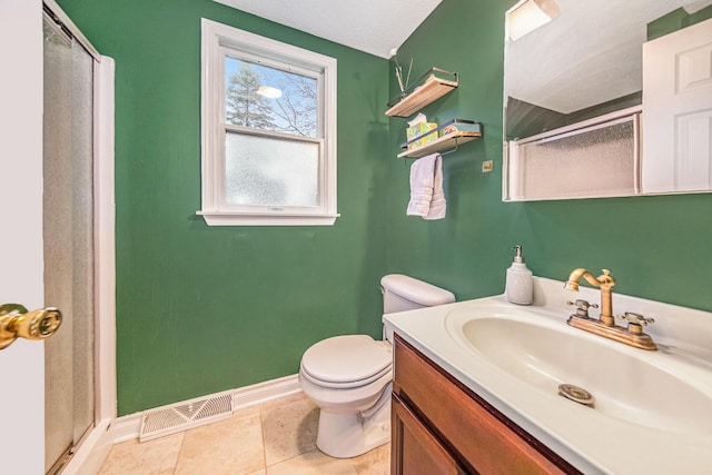 full bathroom with a shower stall, baseboards, visible vents, and toilet