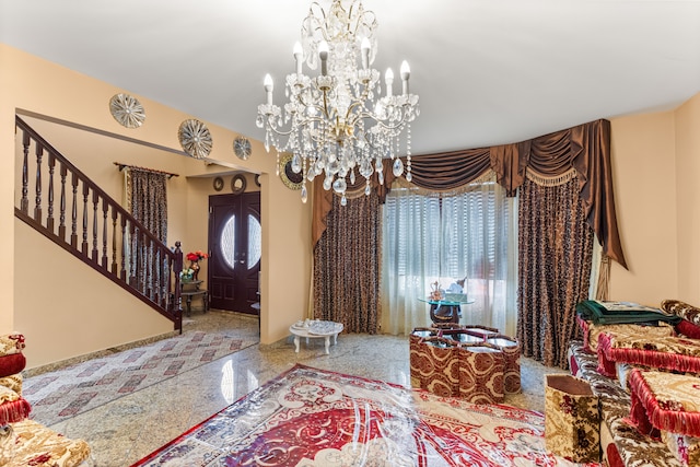 6624 Mead St, Dearborn, MI 48126 - foyer entrance featuring stairs, a notable chandelier, granite finish floor, and baseboards