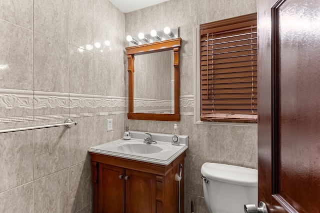 6624 Mead St, Dearborn, MI 48126 - bathroom featuring toilet, tile walls, and vanity