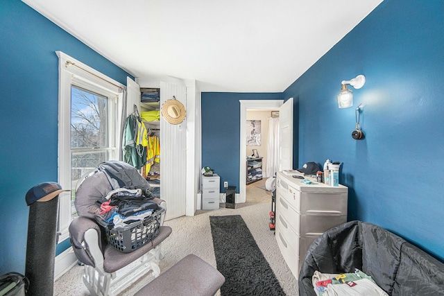 carpeted bedroom with baseboards