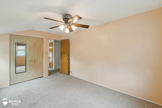 514 Chalmers St, Flint, MI 48503 - unfurnished bedroom with carpet, baseboards, and lofted ceiling