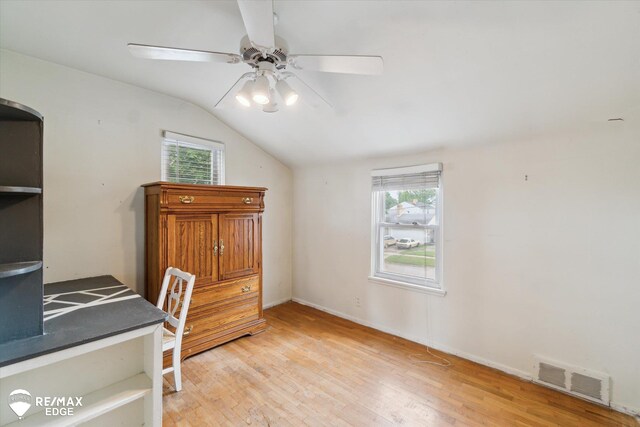 514 Chalmers St, Flint, MI 48503 - office area featuring plenty of natural light, lofted ceiling, a ceiling fan, and wood finished floors
