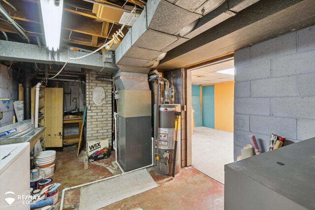 514 Chalmers St, Flint, MI 48503 - unfinished below grade area with gas water heater and washer / dryer