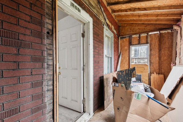 interior space with brick wall