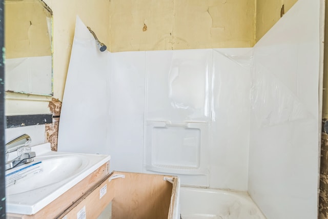 bathroom with vanity and shower / bath combination