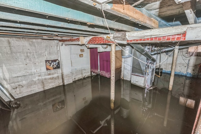unfinished below grade area with heating unit