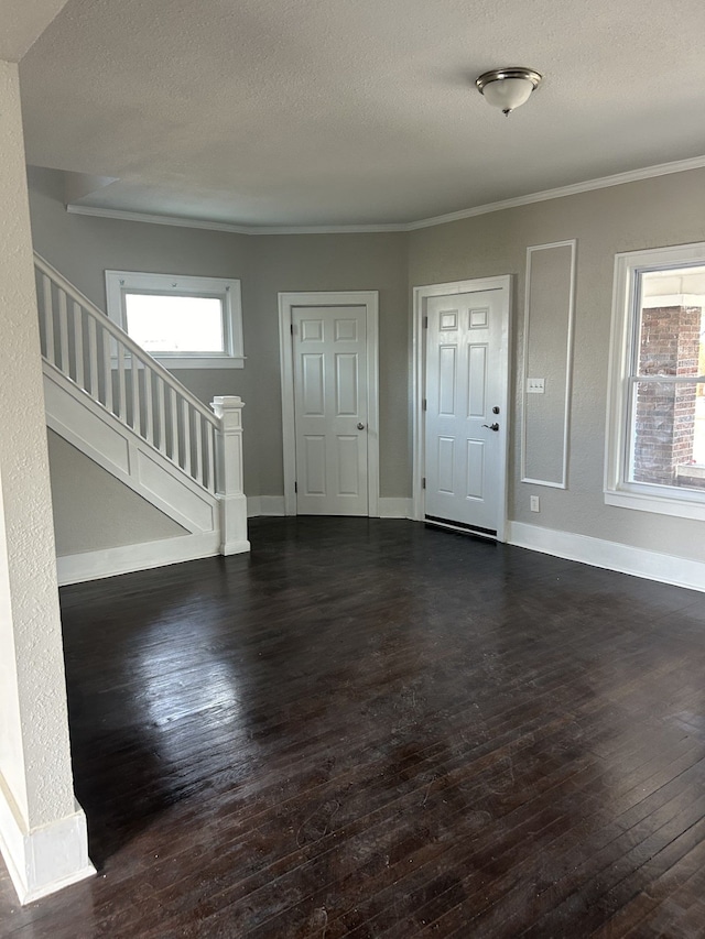533 Lakewood St, Detroit, MI 48215 - foyer with a wealth of natural light, stairway, dark wood-style flooring, and baseboards