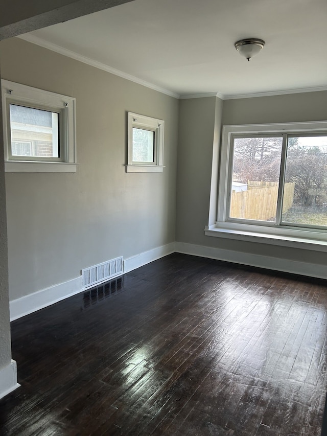 533 Lakewood St, Detroit, MI 48215 - empty room featuring crown molding, hardwood / wood-style floors, baseboards, and visible vents