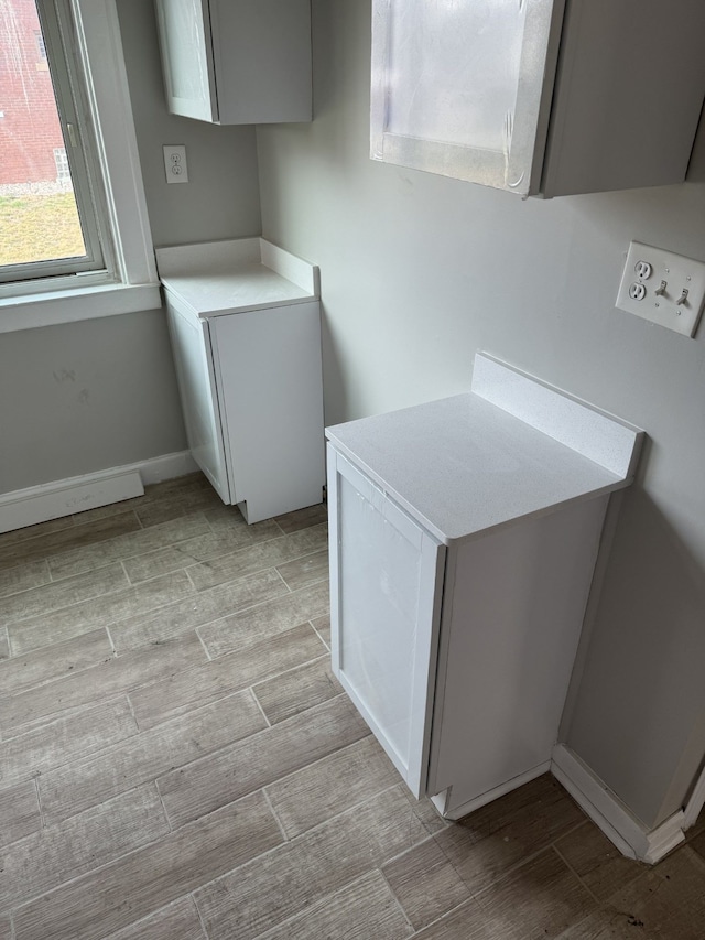 533 Lakewood St, Detroit, MI 48215 - interior space featuring baseboards and wood tiled floor