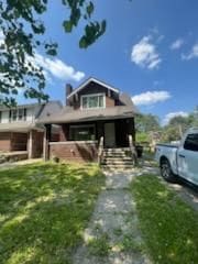 533 Lakewood St, Detroit, MI 48215 - view of front of house with a front lawn