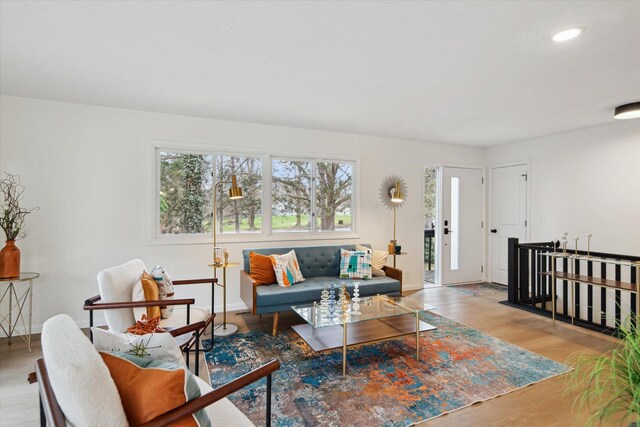 323 13th St, Plainwell, MI 49080 - living room with baseboards, recessed lighting, and wood finished floors