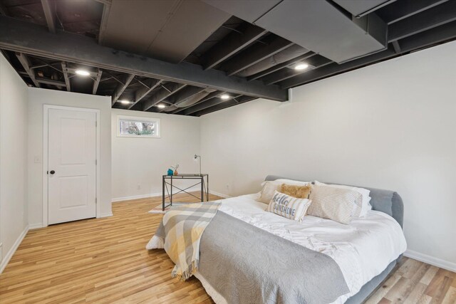 323 13th St, Plainwell, MI 49080 - bedroom with baseboards and wood finished floors