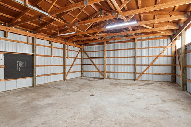 323 13th St, Plainwell, MI 49080 - garage with metal wall
