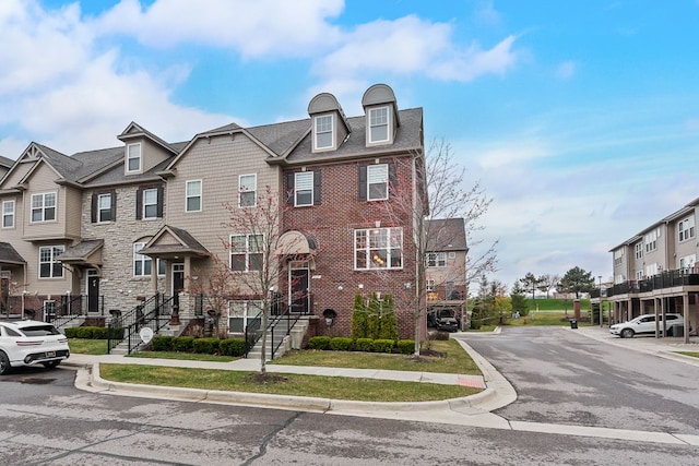 townhome / multi-family property with a residential view