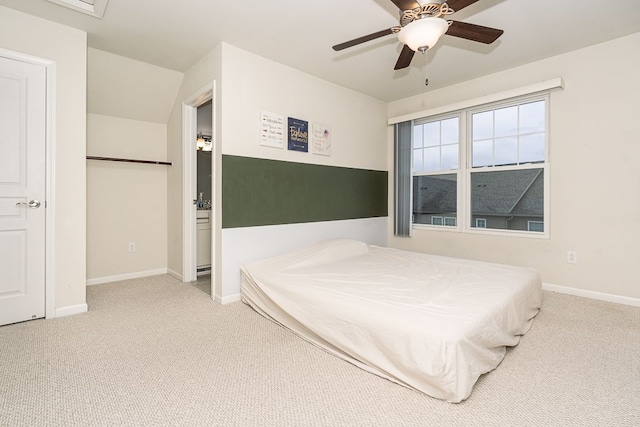 bedroom featuring carpet flooring, baseboards, and a ceiling fan