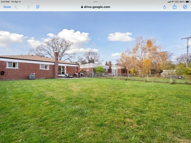 27908 Ryan Rd, Warren, MI 48092 - view of yard featuring central air condition unit and a patio