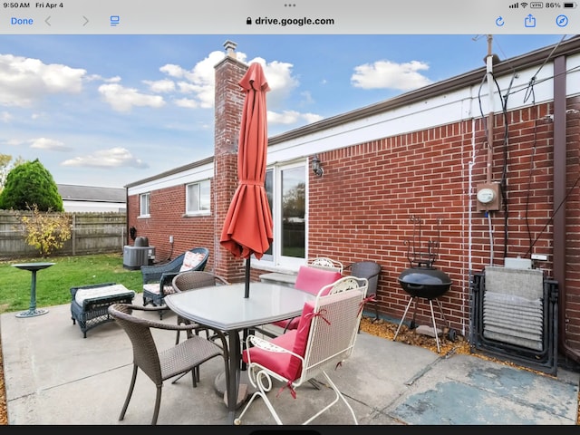 27908 Ryan Rd, Warren, MI 48092 - view of patio with fence and outdoor dining space