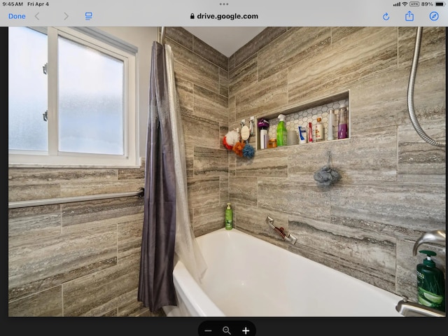 27908 Ryan Rd, Warren, MI 48092 - bathroom featuring shower / bathtub combination with curtain