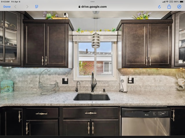 27908 Ryan Rd, Warren, MI 48092 - kitchen featuring dishwasher, a sink, glass insert cabinets, and dark brown cabinets