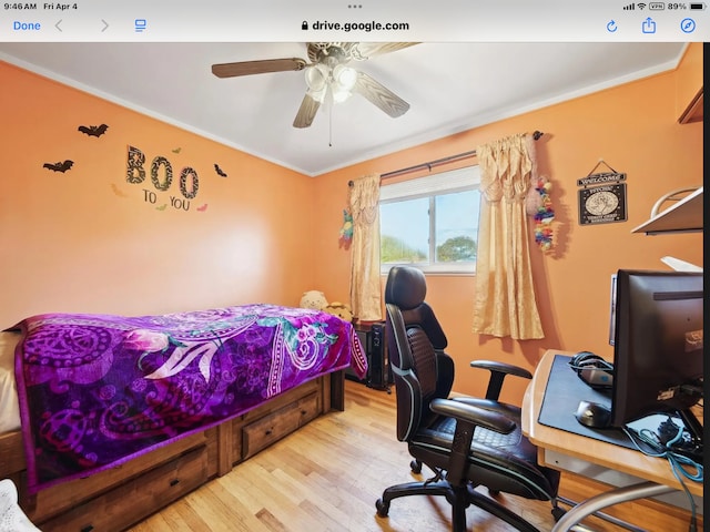 27908 Ryan Rd, Warren, MI 48092 - bedroom featuring light wood-style flooring, ornamental molding, an office area, and a ceiling fan