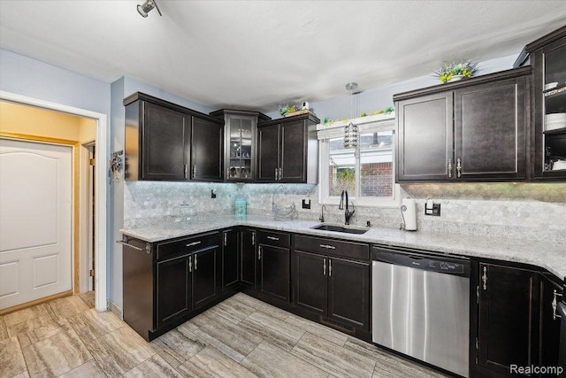 27908 Ryan Rd, Warren, MI 48092 - kitchen with dishwasher, tasteful backsplash, glass insert cabinets, and light stone countertops