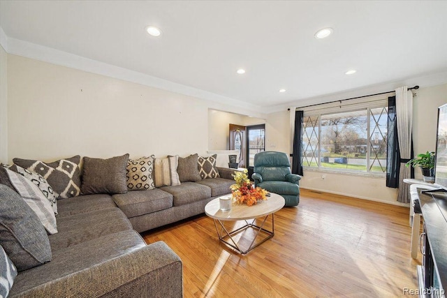27908 Ryan Rd, Warren, MI 48092 - living room featuring light wood finished floors, recessed lighting, and crown molding