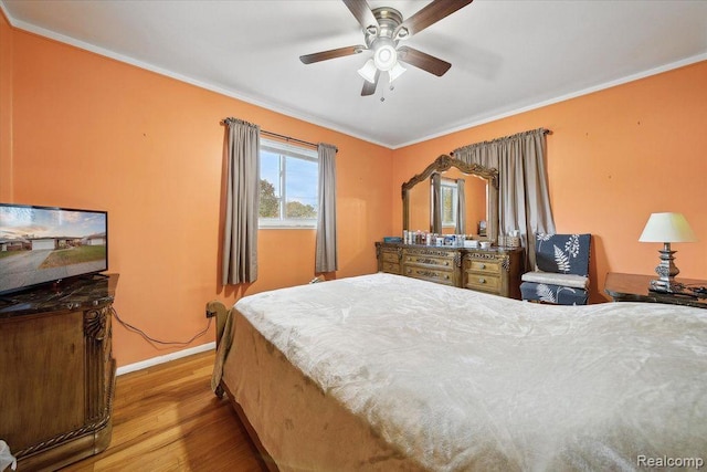 27908 Ryan Rd, Warren, MI 48092 - bedroom with ornamental molding, wood finished floors, and ceiling fan