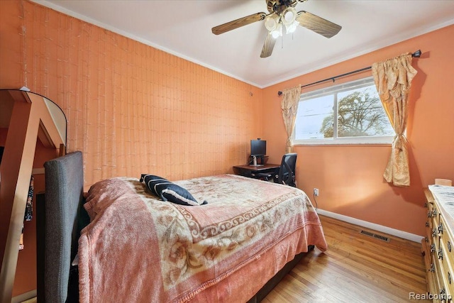 27908 Ryan Rd, Warren, MI 48092 - bedroom featuring wood finished floors, a ceiling fan, and ornamental molding