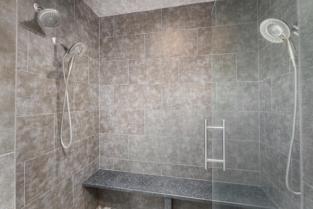 bathroom featuring tiled shower