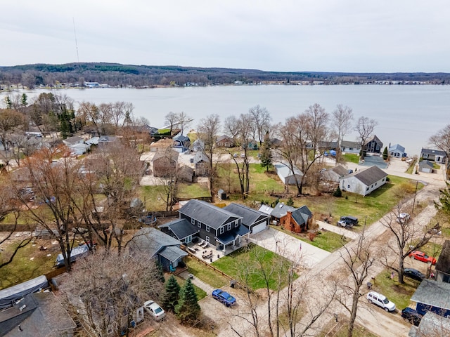 aerial view featuring a water view and a residential view