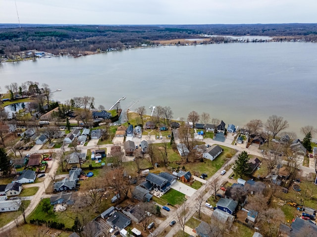 bird's eye view featuring a residential view and a water view