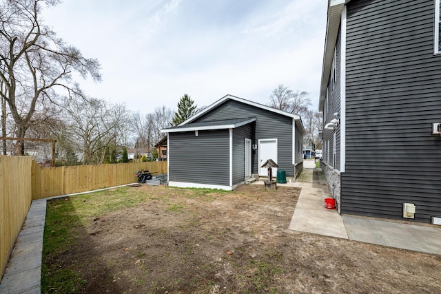 garage with fence