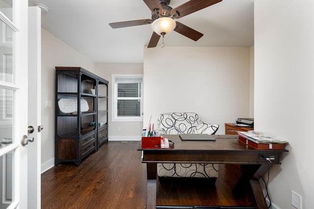 home office with wood finished floors, ceiling fan, and baseboards