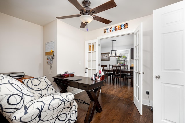office space featuring dark wood-type flooring, french doors, and ceiling fan