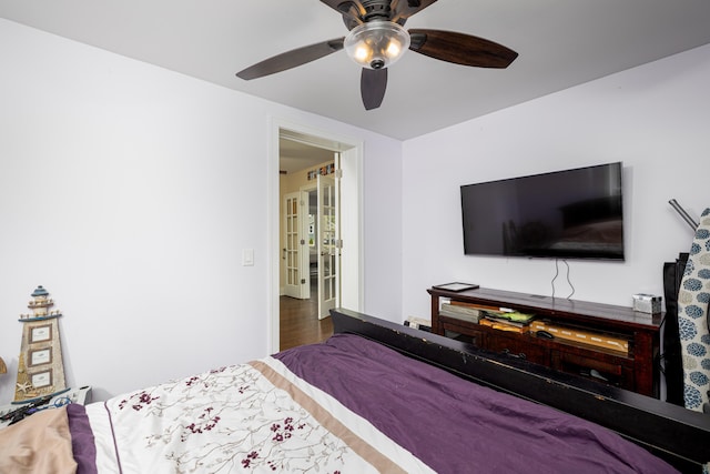 bedroom featuring ceiling fan and wood finished floors