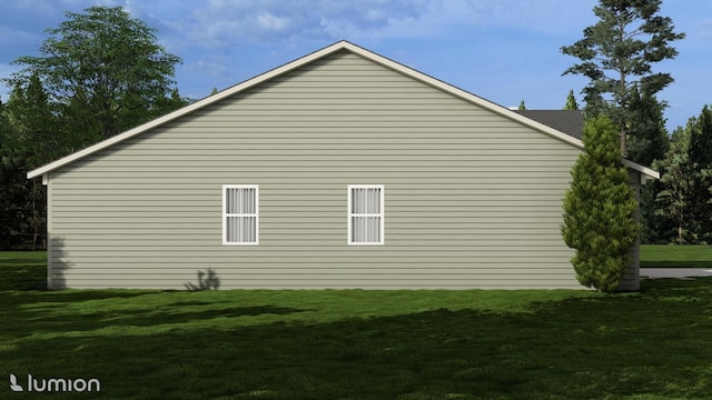 view of side of property featuring a yard