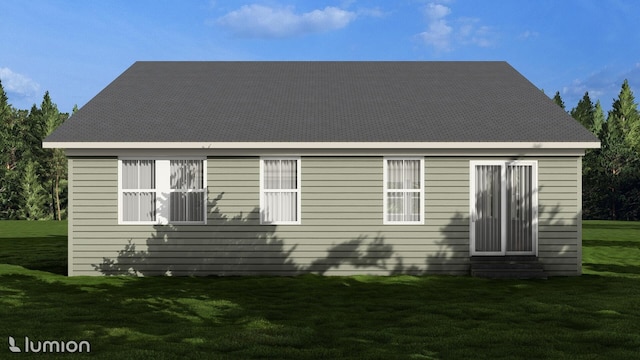 rear view of house featuring a yard