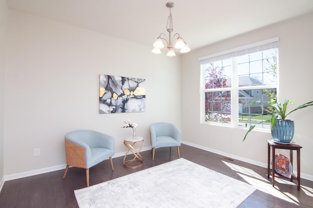 729 Groveland Cir, Ann Arbor, MI 48108 - living area with plenty of natural light, wood finished floors, and a chandelier